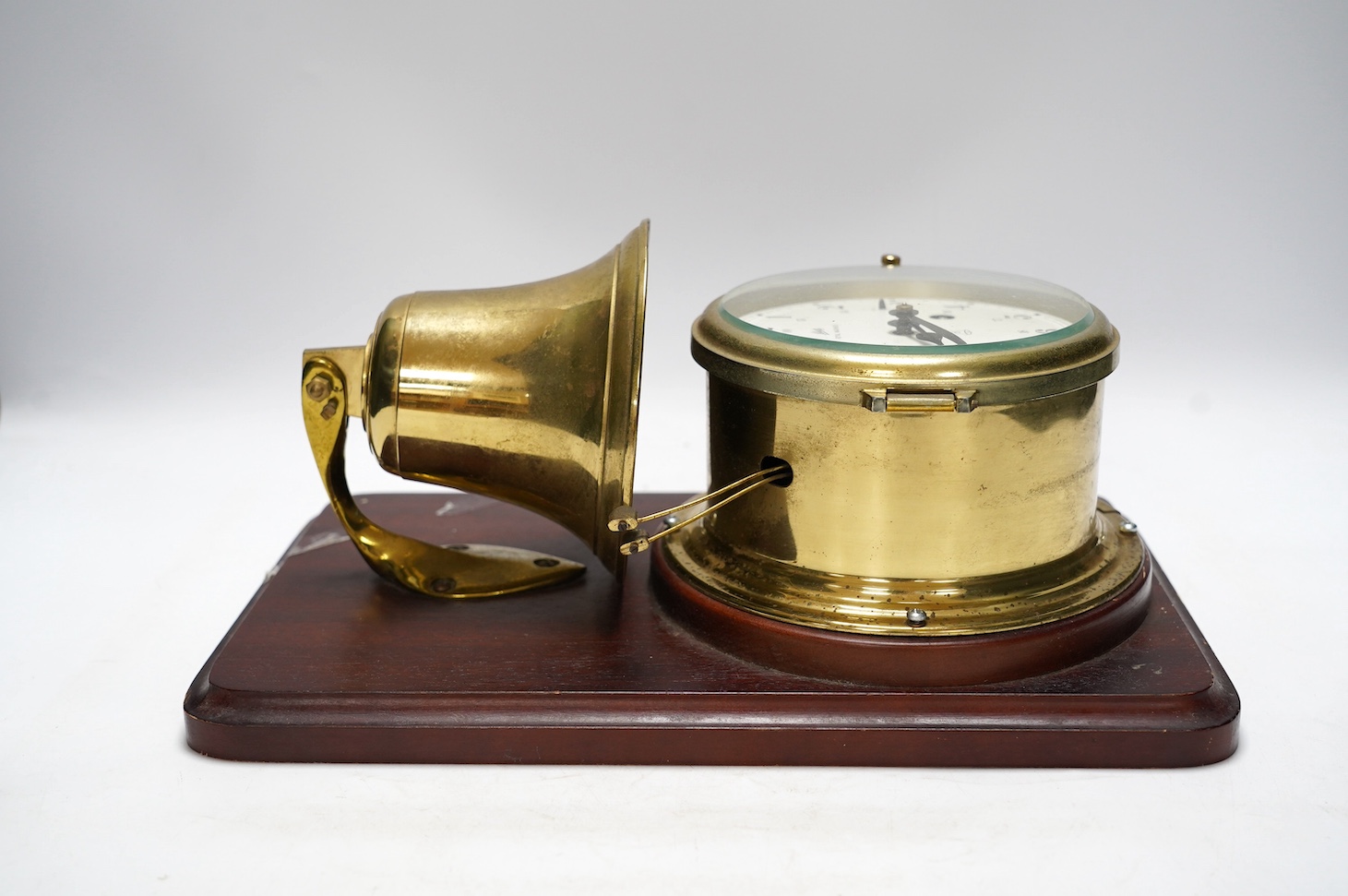 A mounted Schatz Royal Mariner brass clock, 21cm wide, 34cm high. Condition - untested for time keeping